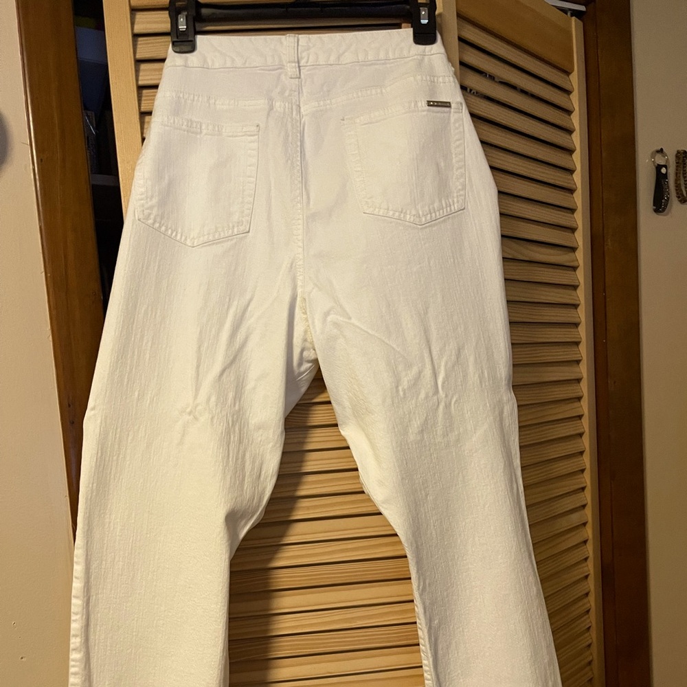 Lightly used winter white Michael Kors jeans size 14.